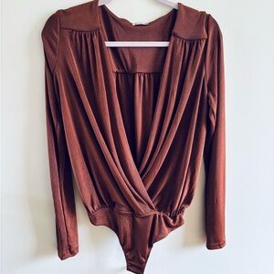 Free People Long Sleeve Surplice Bodysuit in Chestnut Brown